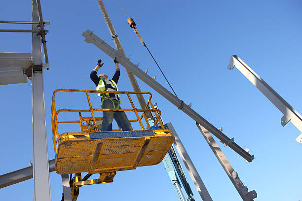 Oz Steel workers fabricating a large steel beam in the Brooklyn workshop.